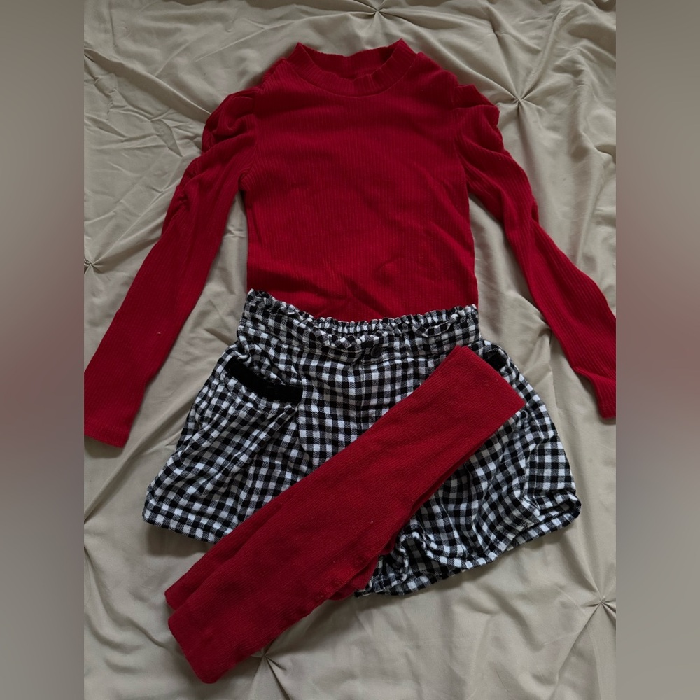 Red Long Sleeve Top with Black and White Checkered Skirt